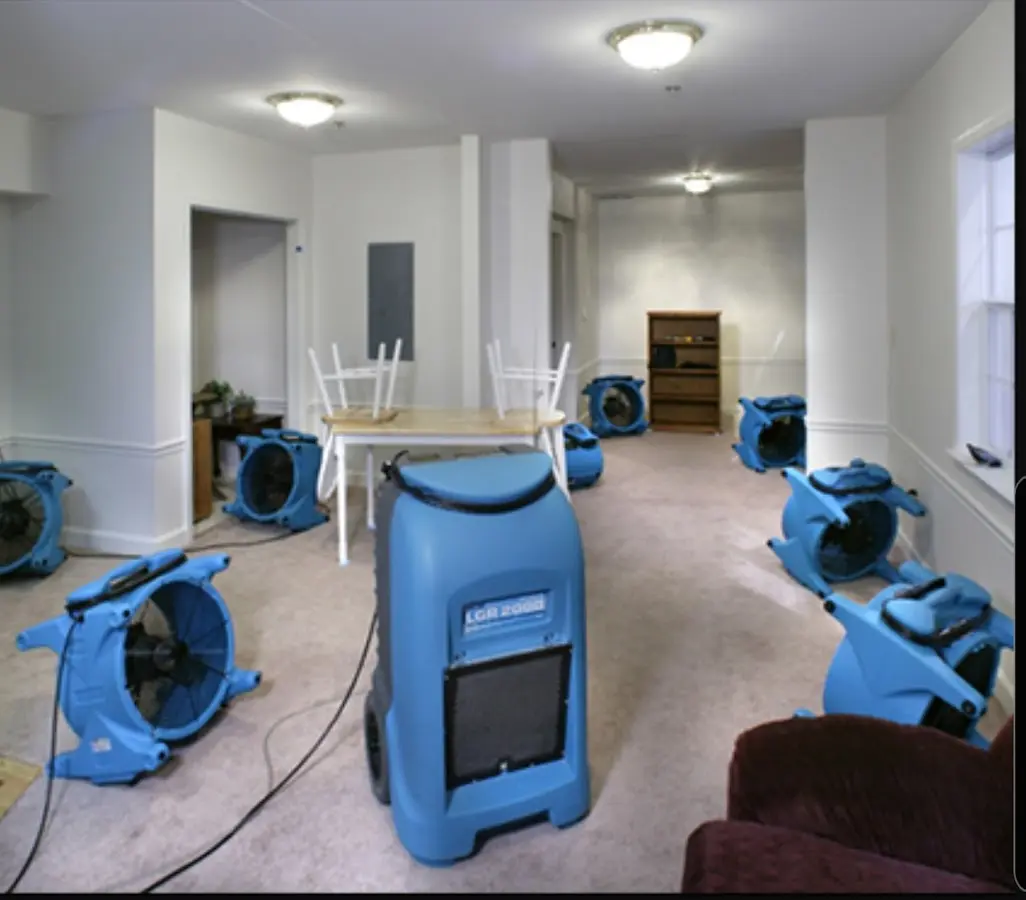 Air movers and dehumidifier setup for Water Damage Restoration in Cordele